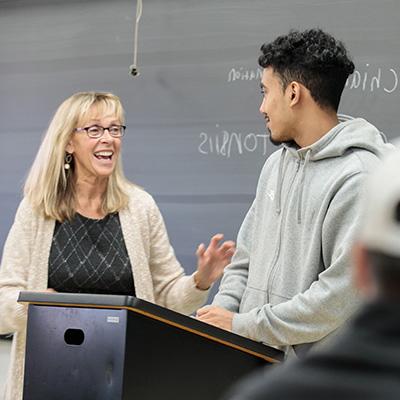 professor speaking with student